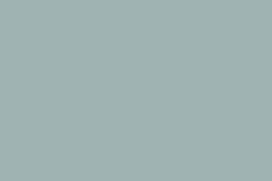 0484 Stormy Bay is a dusty aqua paint color that features gray undertones mixed with cool hues to create a calming, cozy space.